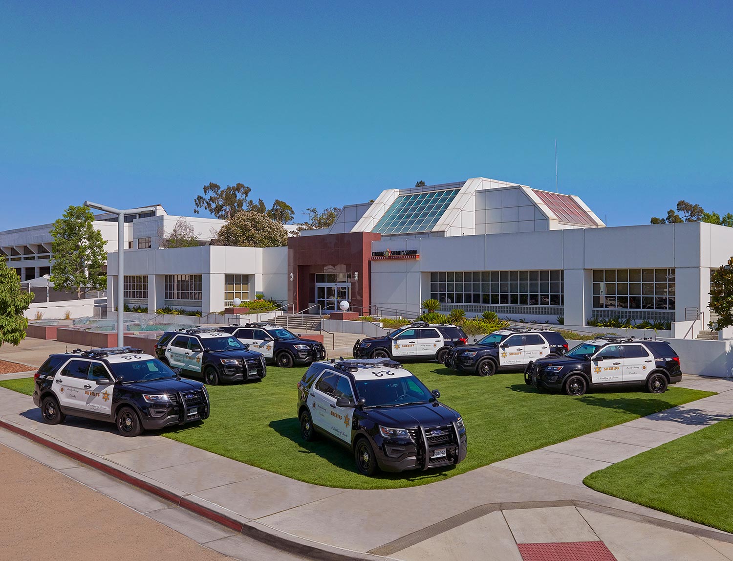 Sheriff vehicles on lawn of Cerritos Sheriff's Station/Community Safety Center