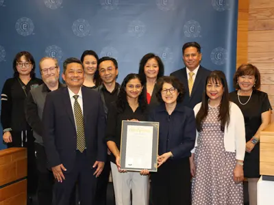Esther Ahn Optometry with Council in Cerritos City Council Chamber