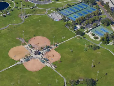 Aerial of Cerritos Sports Complex featuring baseball fields and tennis courts.